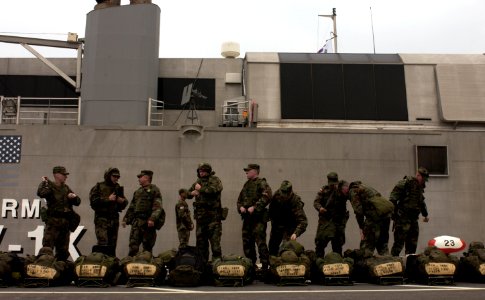 US Navy 050315-F-9629D-181 U.S. Army Soldiers assigned to C Troop, 1st Squadron, 1st U.S. Calvary Regiment, prepare to board the U.S. Army's Theater Support Vessel TSV-1X Spearhead