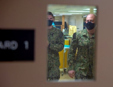 USNS Mercy Religious Program Specialist and Chaplain Makes Rounds (49827311637)