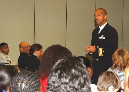 US Navy 050218-N-4729H-008 Navy Astronaut Cmdr. Robert L. Curbeam., Jr. speaks to high school students at a workshop during the Black Engineer of the Year Award career fair