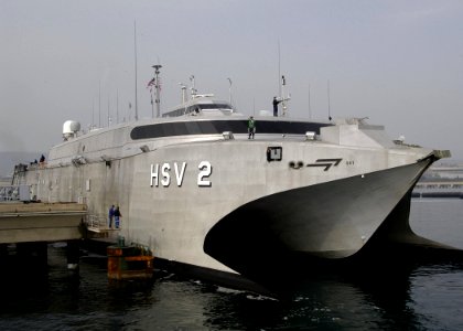 US Navy 050325-N-3503S-002 The High Speed Vessel Two (HSV 2) Swift maneuvers her way into a mooring spot in the port of Augusta Bay, Sicily