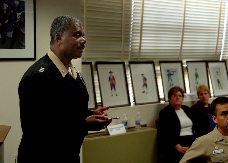 US Navy 050412-N-0962S-013 Task Force Uniform (TFU) Director, Command Master Chief Robert Carroll speaks to the 28-Sailor panel of Petty Officers, Chief Petty Officers and Officers who will be discussing the second phase of TFU