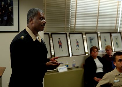 US Navy 050412-N-0962S-013 Task Force Uniform (TFU) Director, Command Master Chief Robert Carroll speaks to the 28-Sailor panel of Petty Officers, Chief Petty Officers and Officers who will be discussing the second phase of TFU
