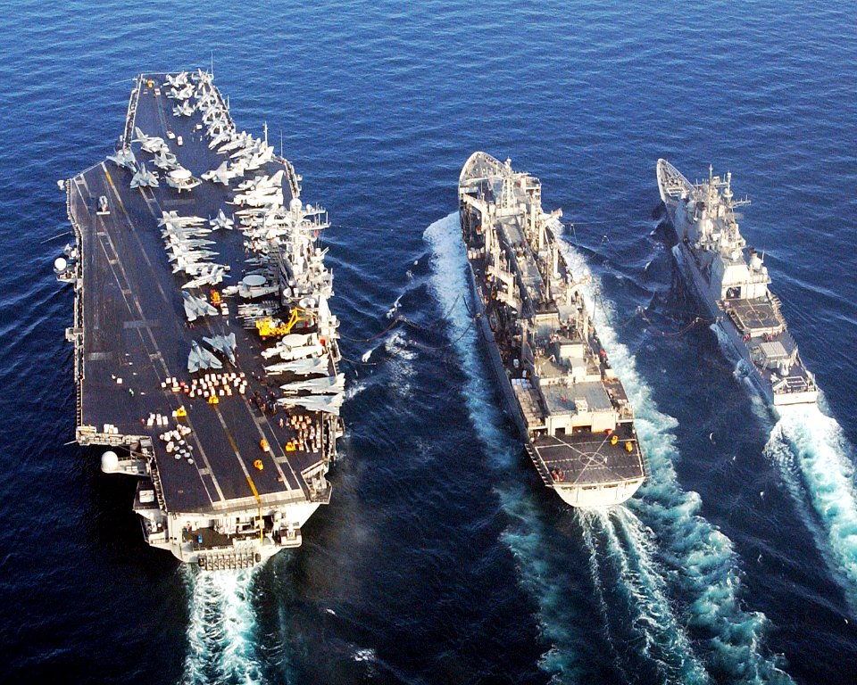 US Navy 050226-N-7422B-003 he Nimitz-class aircraft carrier USS Harry S. Truman (CVN 75) and the guided missile cruiser USS Monterey (CG 61) conducts a replenishment at sea