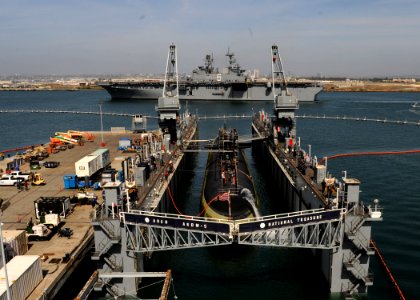 USS America transits San Diego as USS San Francisco pulls into dry dock 150402-N-NB544-068