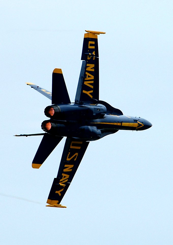 US Navy 050416-N-0295M-205 Lead Solo, Lt. Cmdr. Craig R. Olson, assigned to the U.S. Navy flight demonstration team, the Blue Angels, pulls his F-A-18A Hornet into a tight turn
