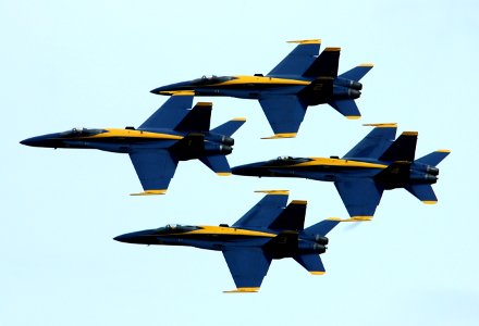 US Navy 050416-N-0295M-129 Four F-A-18A Hornets, assigned to the U.S. Navy's Flight Demonstration Team, the Blue Angels, perform their classic diamond formation maneuver during the 2005 Coastal Carolina Air Show in Wilmington