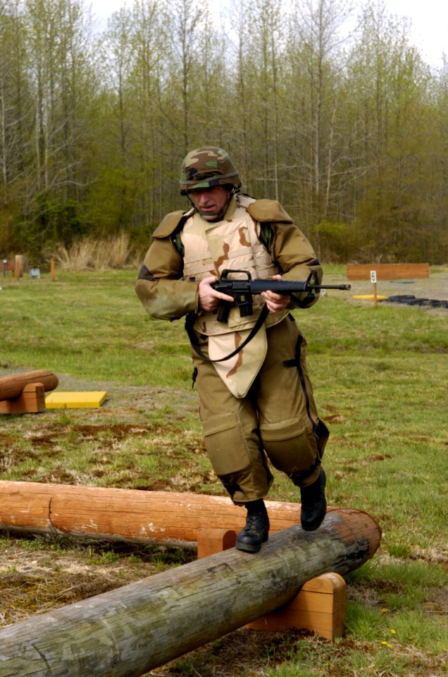 US Navy 050425-N-7676W-024 Sgt. 1st Class James Burcham assigned to the 16th Ordinance Battalion tests new flexible arm and leg protective armor