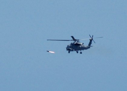 US Navy 050427-N-7512V-005 An HH-60H Seahawk helicopterfires an AGM-114B Hellfire missile at a weapons training site