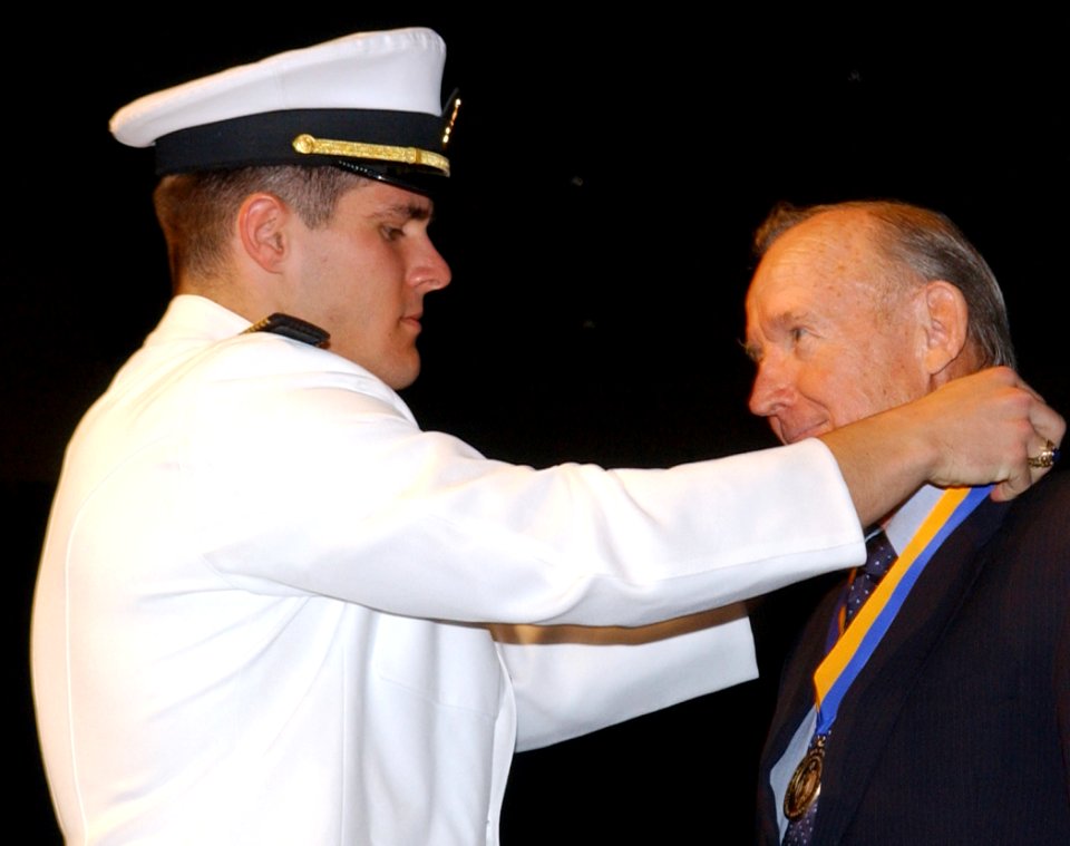 US Navy 050415-N-0000X-001 Retired Adm. Ronald J. Hays receives the U.S. Naval Academy's Distinguished Graduate Award from Brigade Commander Midshipman Luke Kelvington