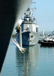 US Navy 050503-N-3019M-004 The Japanese Navy destroyer JDS Murasame (DD 101) prepares to moor alongside the Japanese Navy training ship JDS Kashima (TV 3508) after entering Pearl Harbor for a three-day port visit