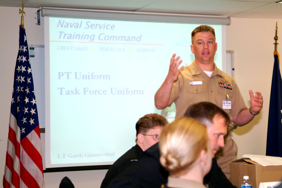 US Navy 050413-N-0962S-010 Lt. Garth Gimmestad, assigned to Recruit Training Command, Great Lakes, Ill., briefs the Task Force Uniform Phase II Conference on the options currently available for a standard Navy-wide physical tra