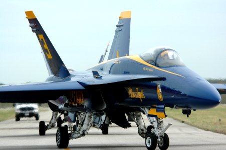 US Navy 050416-N-0295M-493 U.S. Marine Corps Maj. Matthew C. Shortal, Left Wing pilot assigned to the U.S. Navy fight demonstration team, the Blue Angels, taxis his F-A-18A Hornet back to the flight line