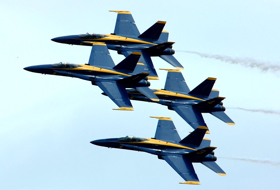 US Navy 050416-N-0295M-100 Four F-A-18A Hornets, assigned to the U.S. Navy's Flight Demonstration Team, the Blue Angels, perform their classic diamond formation maneuver during the 2005 Coastal Carolina Air Show