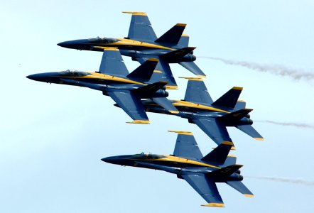 US Navy 050416-N-0295M-100 Four F-A-18A Hornets, assigned to the U.S. Navy's Flight Demonstration Team, the Blue Angels, perform their classic diamond formation maneuver during the 2005 Coastal Carolina Air Show
