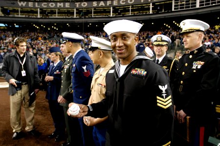US Navy 050405-N-6477M-340 Hospital Corpsman 1st Class Jermaine K. Williams, assigned to Naval Hospital Bremerton, Wash., prepares to take the field to throw the first pitch during the Boeing Salute to Armed Forces Night at SAF photo