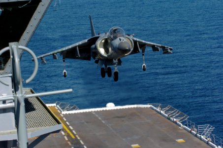 US Navy 050406-N-9866B-008 A Marine Corps AV-8B Harrier II, assigned to the Nightmare of Marine Attack Squadron Five One Three (VMA-513), lands on the flight deck of the amphibious assault ship USS Peleliu (LHA 5)
