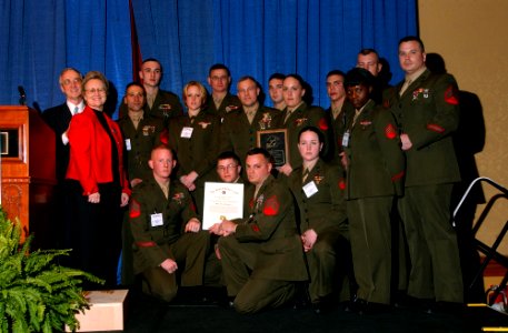 US Navy 050322-N-2568S-090 U.S. Marines assigned to Marine Air Group Fourteen (MAG-14) pose for a photograph after being recognized by Secretary of the Navy, Gordon England at the Navy League's Secretary of the Navy lunch