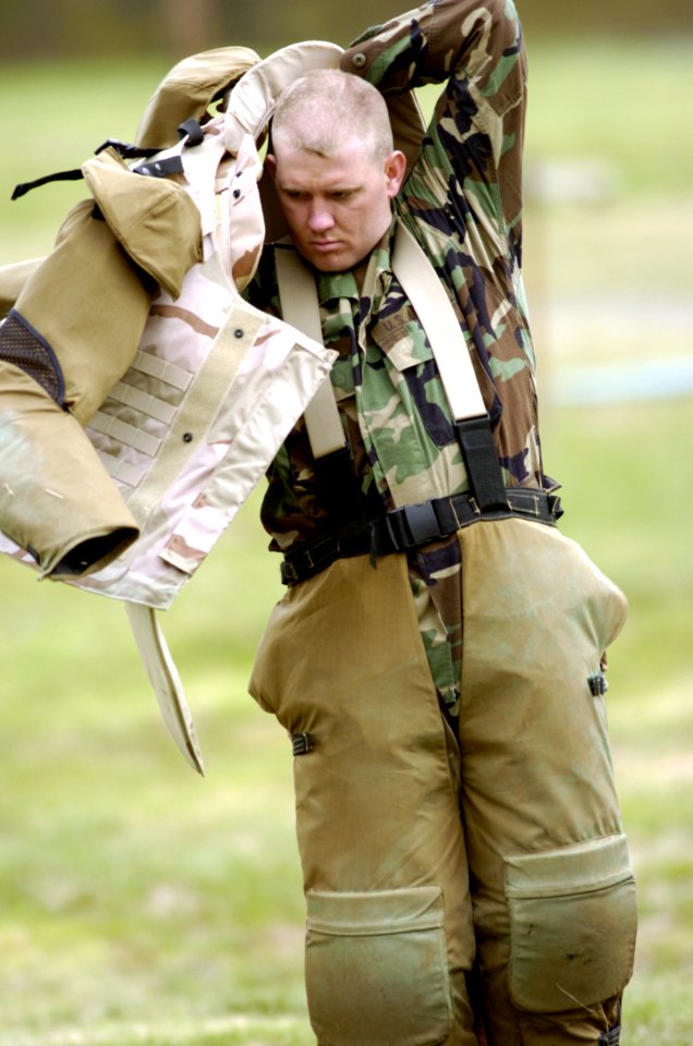 US Navy 050425-N-7676W-055 Staff Sgt. Anthony J. Manske assigned to the 16th Ordinance Battalion wears a new flexible arm and leg protective armor