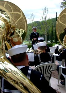 US Navy 050505-N-2893B-002 The 6th Fleet Bandmaster, Lt. Bruce McDonald, provides music for a ceremony celebrating the 60th Anniversary World War II (WWII), at Italy's Florence American Cemetery and Memorial