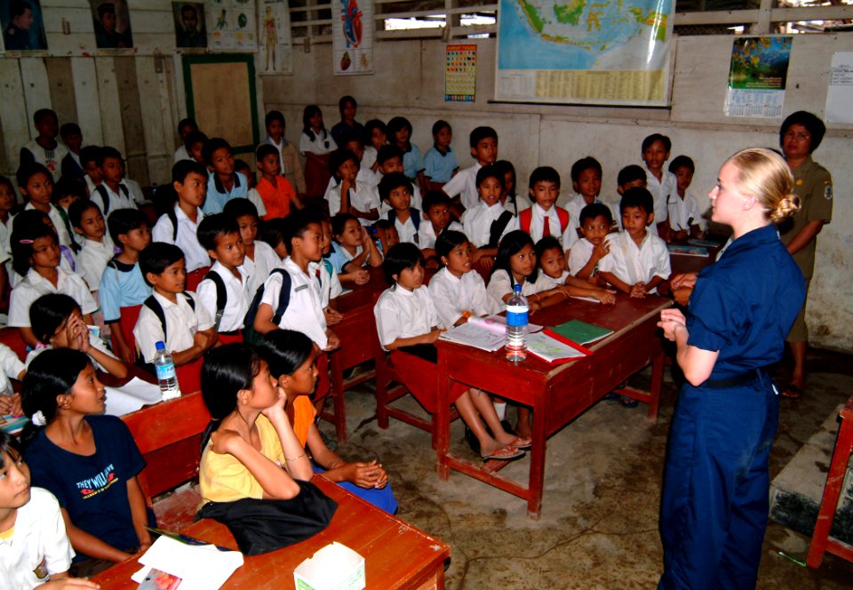 US Navy 050427-N-0357S-009 Hospital Corpsman 2nd Class Cyrena Williams teaches a class on infectious disease to students at a school on the island of Nias