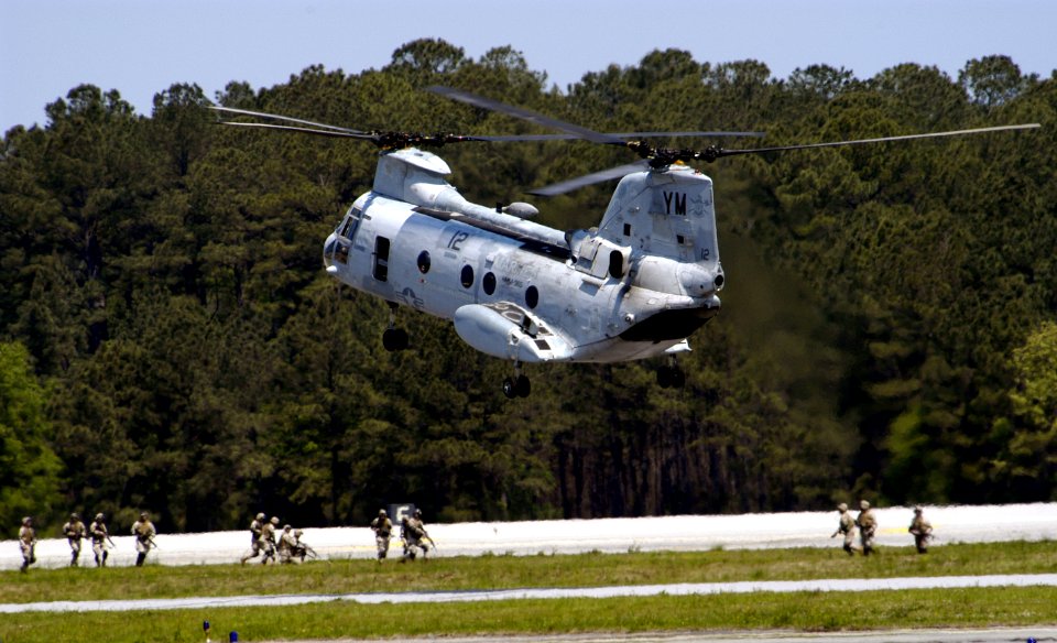 US Navy 050507-N-0295M-014 A CH-46E Sea Knight helicopter, assigned to the Blue Knights of Marine Medium Helicopter Squadron Three Six Five (HMM-365), prepares to land to pick up Marines during the Marine Air Grou