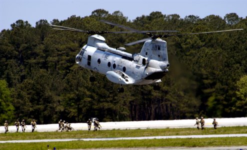 US Navy 050507-N-0295M-014 A CH-46E Sea Knight helicopter, assigned to the Blue Knights of Marine Medium Helicopter Squadron Three Six Five (HMM-365), prepares to land to pick up Marines during the Marine Air Grou