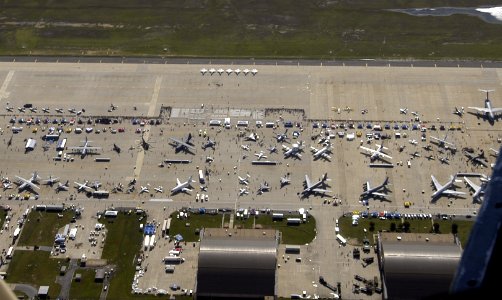 US Navy 050521-N-0295M-003 An aerial view of the Andrews Air Force Base flight line from the U.S. Army Parachute Team, the Golden Knights C-31 jump plane, during the first public day of the 2005 Joint Service Open House