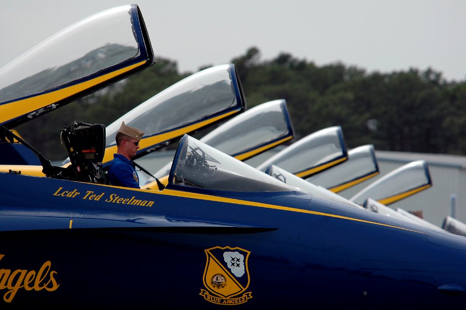 US Navy 050416-N-0295M-507 Opposing Solo, Lt. Cmdr. Theodore J. Steelman, assigned to the U.S. Navy flight demonstration team, the Blue Angels, awaits the cue to exit his F-A-18A Hornet