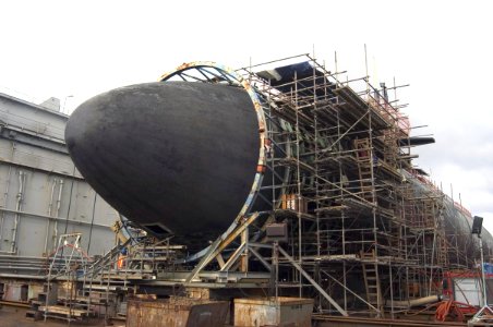 US Navy 050508-N-0000X-001 The Los Angeles class submarine USS San Francisco (SSN 711) shown in dry dock is having repairs made on its damaged bow photo