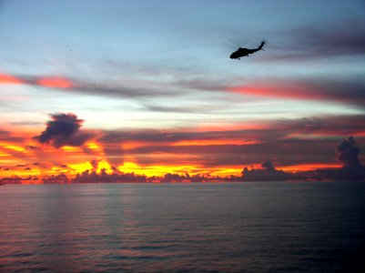 US Navy 050525-N-4104L-001 An SH-60B Seahawk helicopter from Helicopter Anti-submarine Squadron Lite 45 (HSL-45), Det. 1, flies into the South China Sea