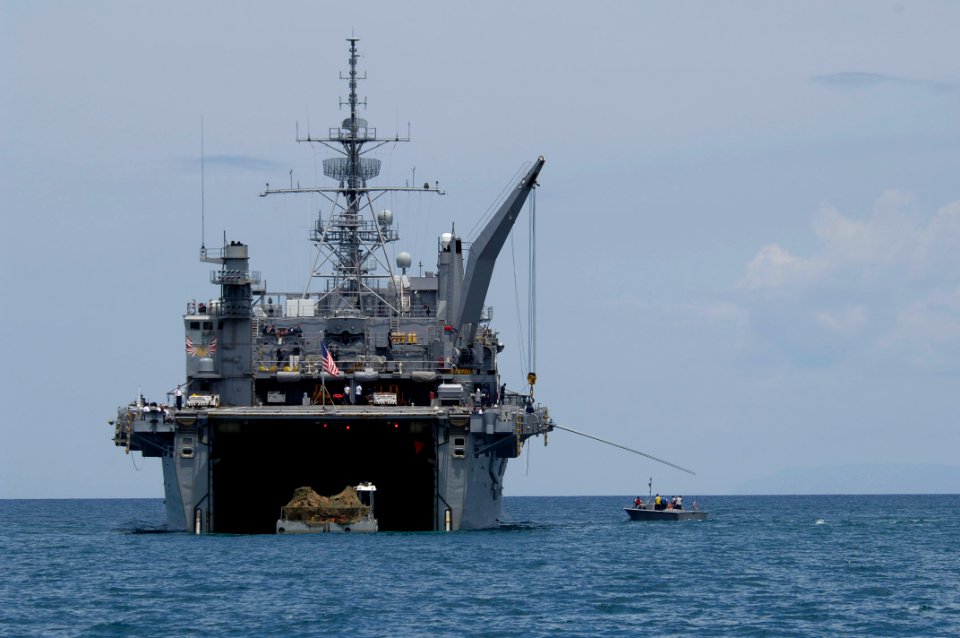 US Navy 050509-N-3642E-015 The amphibious transport dock ship USS Austin (LPD 4) operates off the coast of Haiti in supports of the retro grade of New Horizons' equipment and personnel after the successful completion of a