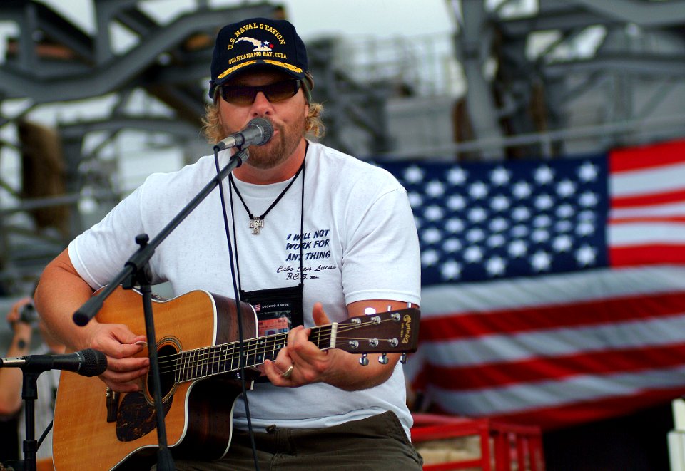 US Navy 050512-N-0962S-108 Two-time Academy of Country Music Entertainer of the Year, Toby Keith, performs for Sailors aboard USS Austin (LPH 4)