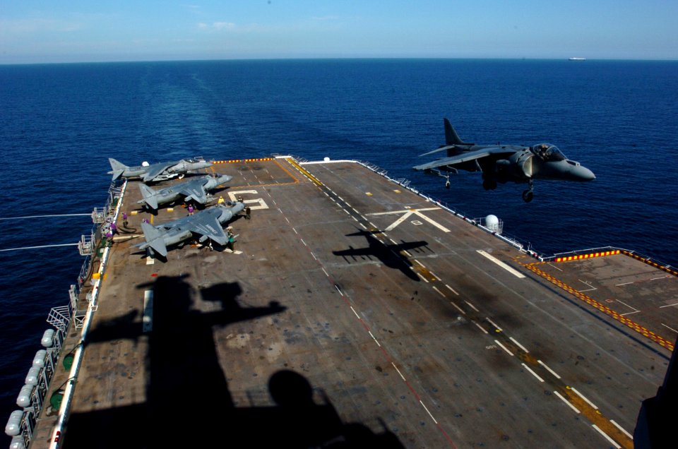 US Navy 050406-N-9866B-023 A Marine Corps AV-8B Harrier II, assigned to the Nightmare of Marine Attack Squadron Five One Three (VMA-513), lands on the flight deck of the amphibious assault ship USS Peleliu (LHA 5)
