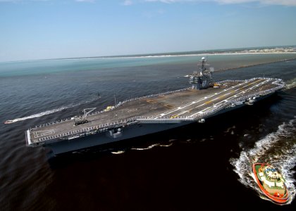 US Navy 050516-N-8704K-001 Sailors assigned to USS John F. Kennedy (CV 67) and embarked Marine Expeditionary Unit Two Four (24th MEU) man the rails as the carrier depart its homeport of Mayport, Fla