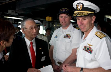 US Navy 050520-N-9851B-006 Commander Brad Smith, center, explains operations on the bridge of USS Fitzgerald to Mayor of Shimoda City, Mr. Naoki Ishii, and Commander Naval Forces Japan Rear Admiral Frederic Ruehe photo