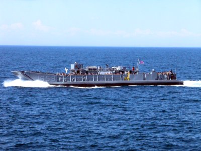 US Navy 050529-N-9543M-048 Sea Cadets from upstate New York get a ride aboard a Landing Craft Utility vehicle while touring the dock landing ship USS Shreveport (LPD 12)