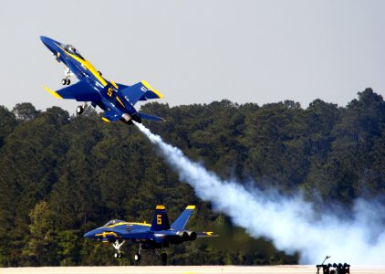 US Navy 050507-N-0295M-058 Lead Solo, Lt. Cmdr. Craig R. Olson, assigned to the U.S. Navy flight demonstration team, the Blue Angels, pulls his F-A-18A Hornet up sharply as the Opposing Solo