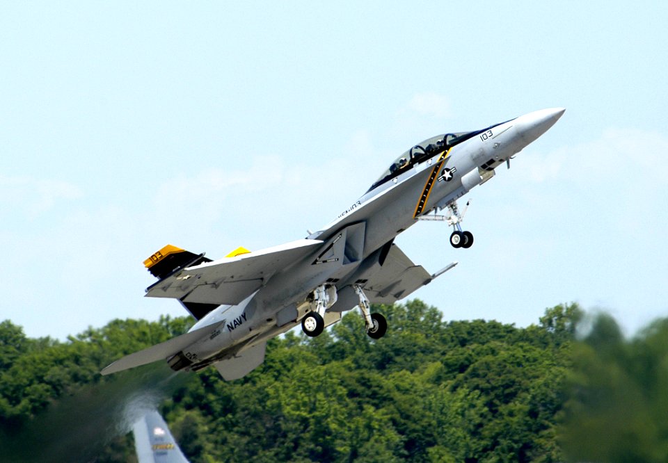 US Navy 050521-N-0295M-053 An F-A-18F Super Hornet pulls up sharply, demonstrating its ability to quickly takeoff during a flight demonstration at the 2005 Joint Service Open House