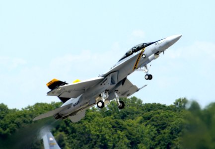 US Navy 050521-N-0295M-053 An F-A-18F Super Hornet pulls up sharply, demonstrating its ability to quickly takeoff during a flight demonstration at the 2005 Joint Service Open House