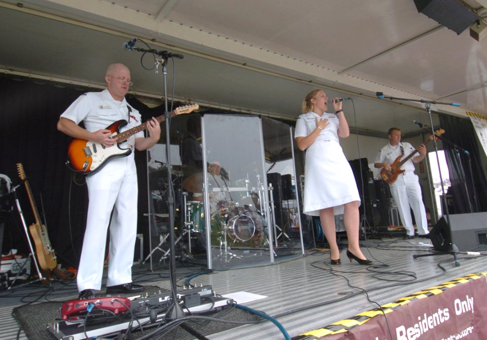 US Navy 050521-N-4541B-002 Navy Band Southwest's rock band Millennium provides live musical entertainment for the San Diego 19th Annual Bay Bridge Run-Walk post party