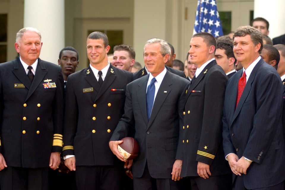 US Navy 050420-N-0000A-003 President George W. Bush, center, poses for a photograph with members of the U.S. Naval Academy football team fter the presentation of the Commander-In-Chief's Trophy in Rose Garden at the White Hous