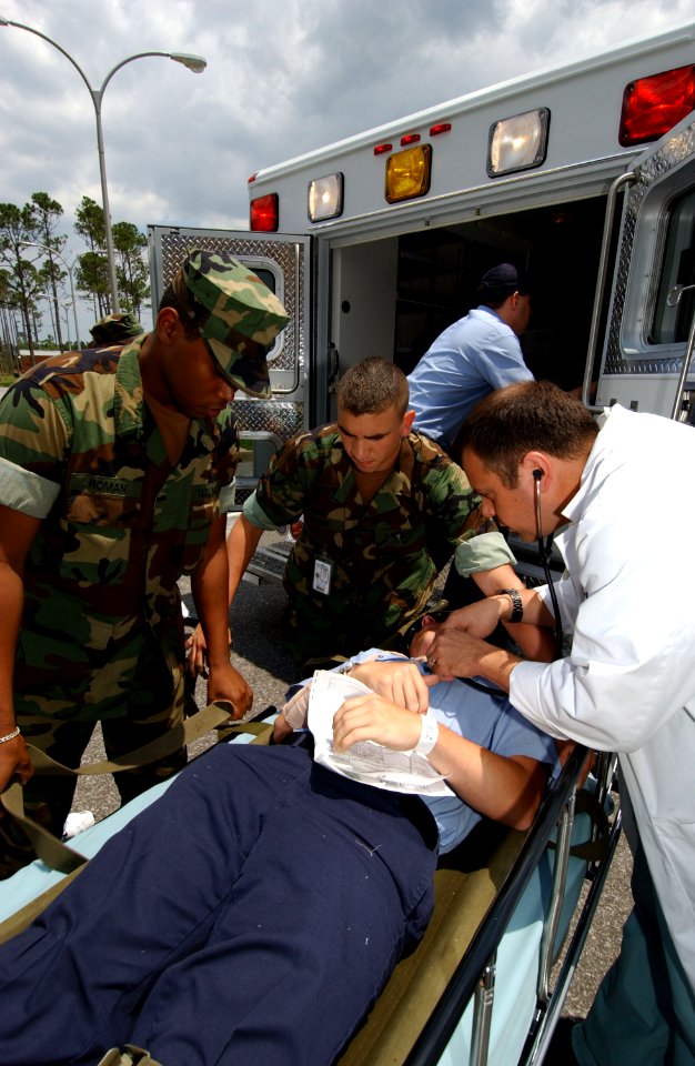US Navy 050526-F-5586B-058 U.S. Navy medical personnel provide medical assistance to a simulated patient during exercise Lifesaver 2005 at Pensacola Naval Air Station. Military personnel join local, state and federal agencies i