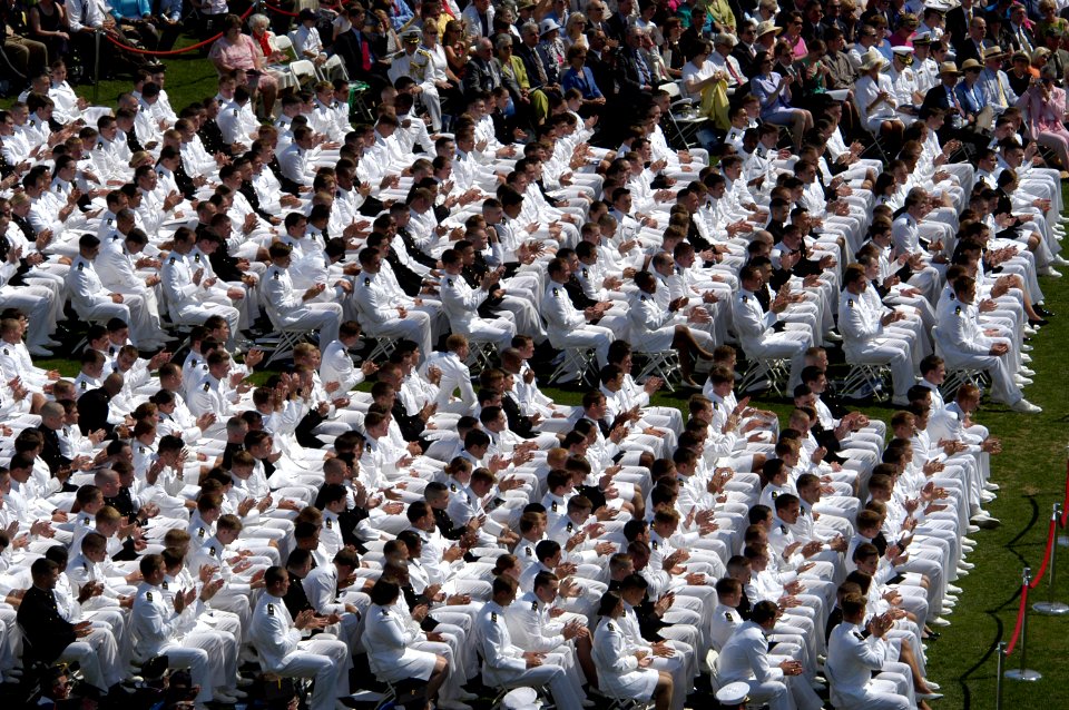 US Navy 050527-N-0295M-004 U.S. Naval Academy Midshipmen applaud President George W. Bush during his graduation address as part of the 2005 Graduation and Commissioning Ceremony at the U.S. Naval Academy