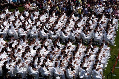 US Navy 050527-N-0295M-004 U.S. Naval Academy Midshipmen applaud President George W. Bush during his graduation address as part of the 2005 Graduation and Commissioning Ceremony at the U.S. Naval Academy