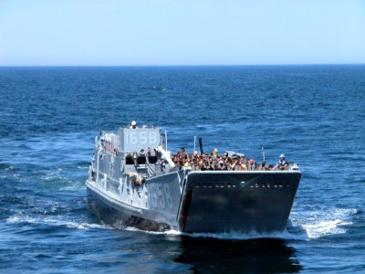 US Navy 050529-N-9543M-052 Sea Cadets from upstate New York get a ride aboard a Landing Craft Utility vehicle while touring the dock landing ship USS Shreveport (LPD 12)