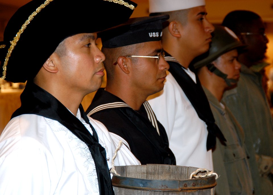 US Navy 050617-N-3019M-002 Sailors display a variety of uniforms worn by U.S. Navy Hospital Corpsmen during a uniform pageant as part of the 107th Hospital Corps Birthday Ball