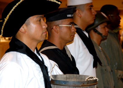 US Navy 050617-N-3019M-002 Sailors display a variety of uniforms worn by U.S. Navy Hospital Corpsmen during a uniform pageant as part of the 107th Hospital Corps Birthday Ball