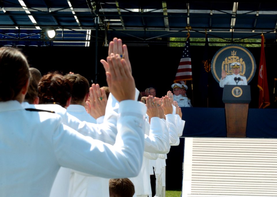 US Navy 050527-N-9693M-021 The Chief of Naval Operations, Adm. Vern Clark administrates the Oath of Office for Midshipmen becoming Ensigns in the United States Navy as part of the U.S. Naval Academy class of 2005 Graduation and