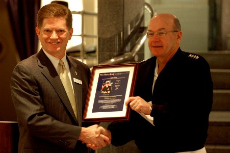 US Navy 050525-N-0295M-001 President and Chief Executive Officer of the U.S. Navy Memorial Foundation, Retired Rear Adm. Richard A. Buchanan, presents Chief of Naval Operations, Adm. Vern Clark, a framed copy of his U.S. Navy L