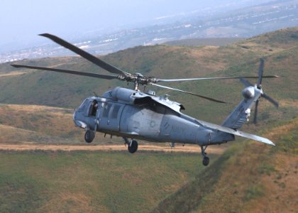 US Navy 050517-N-9500T-013 An MH-60S Seahawk helicopter assigned to Helicopter Sea Combat Squadron Two One (HSC-21) breaks right to avoid simulated ground fire during a training mission at Marine Corps Base Camp Pendleton